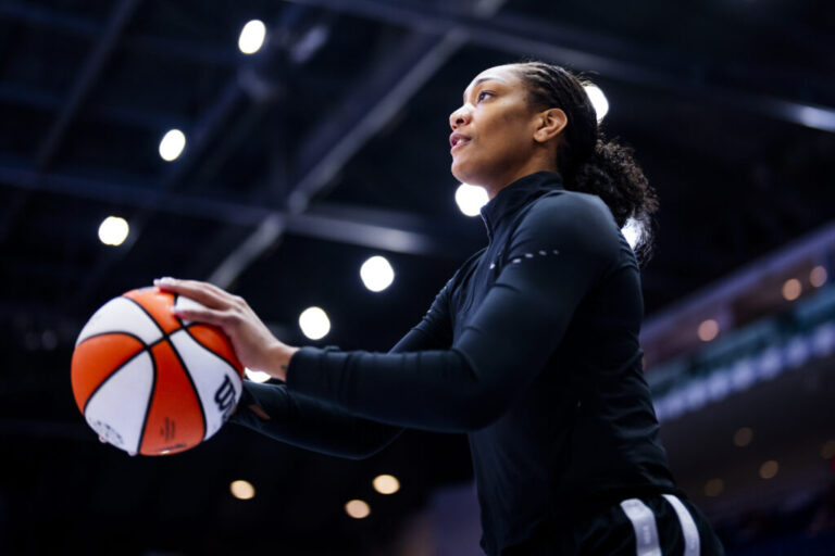 A'ja Wilson #22 of the Las Vegas Aces warms up before playing against the Toronto Tempo at Coca-Cola Coliseum on July 20, 2026 in Toronto, Canada.