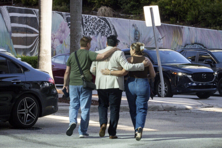 People embrace as they leave the Miami Immigration Court on Wednesday, Sept. 2, 2026 in Miami, Fla. Eva Marie Uzcategui for NPR