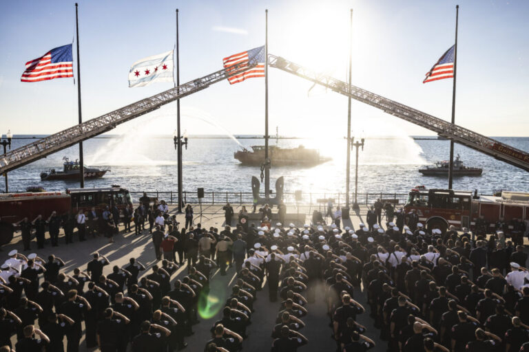 Members of the Chicago Fire Department commemorate the 25th anniversary of the Sept. 11, 2001, terrorist attacks during a ceremony at Navy Pier, Friday, Sept. 11, 2026.