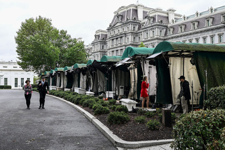 Broadcast news workspaces are seen outside the White House in Washington, D.C., on Wednesday.