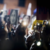 Demonstrators raise pictures of slain journalist Daphne Caruana Galizia during a demonstration in 2019.