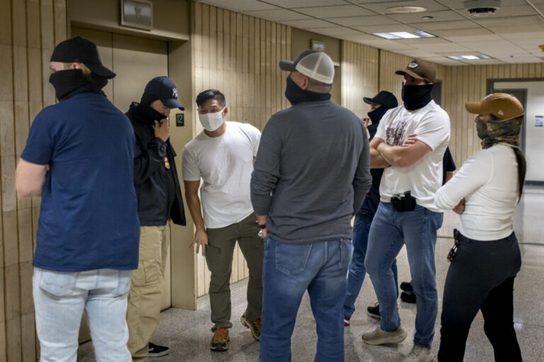 Federal agents patrol the halls of immigration court at the Jacob K. Javitz Federal Building. Immigration and Customs Enforcement (ICE) agents and other federal agencies continue to make detainments in immigration courts as people attend their court hearings.