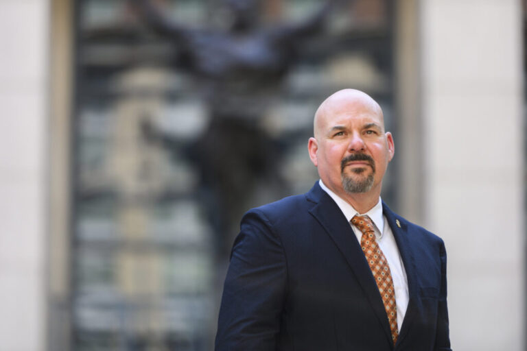 Special Agent Matt Grimm stands outside the U.S. District Court in Alexandria, Virginia.