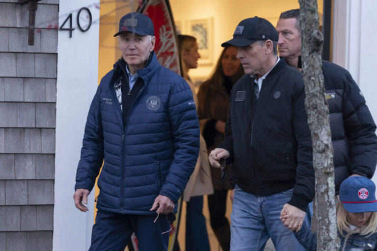 President Biden and his son Hunter Biden walk in downtown Nantucket, Mass., on Friday.