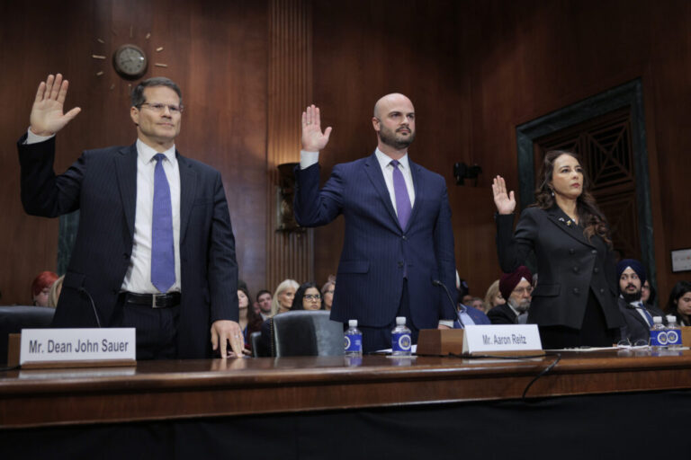 Harmeet Dhillon, far right, is sworn in during her confirmation hearing before the Senate Judiciary Committee in February 2025 in Washington, D.C.