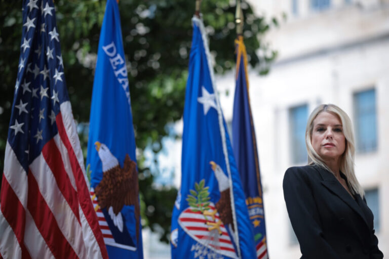 U.S. Attorney General Pam Bondi is seen during a press conference on May 7 in Washington, D.C. Bondi's Department of Justice recently charged a few noncitizens for alleged illegal voting, citing assistance from the Department of Government Efficiency, or DOGE.